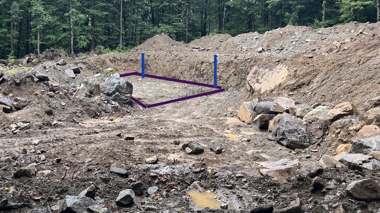 Outline of the future entryway Outlined entryway area in the dug foundation