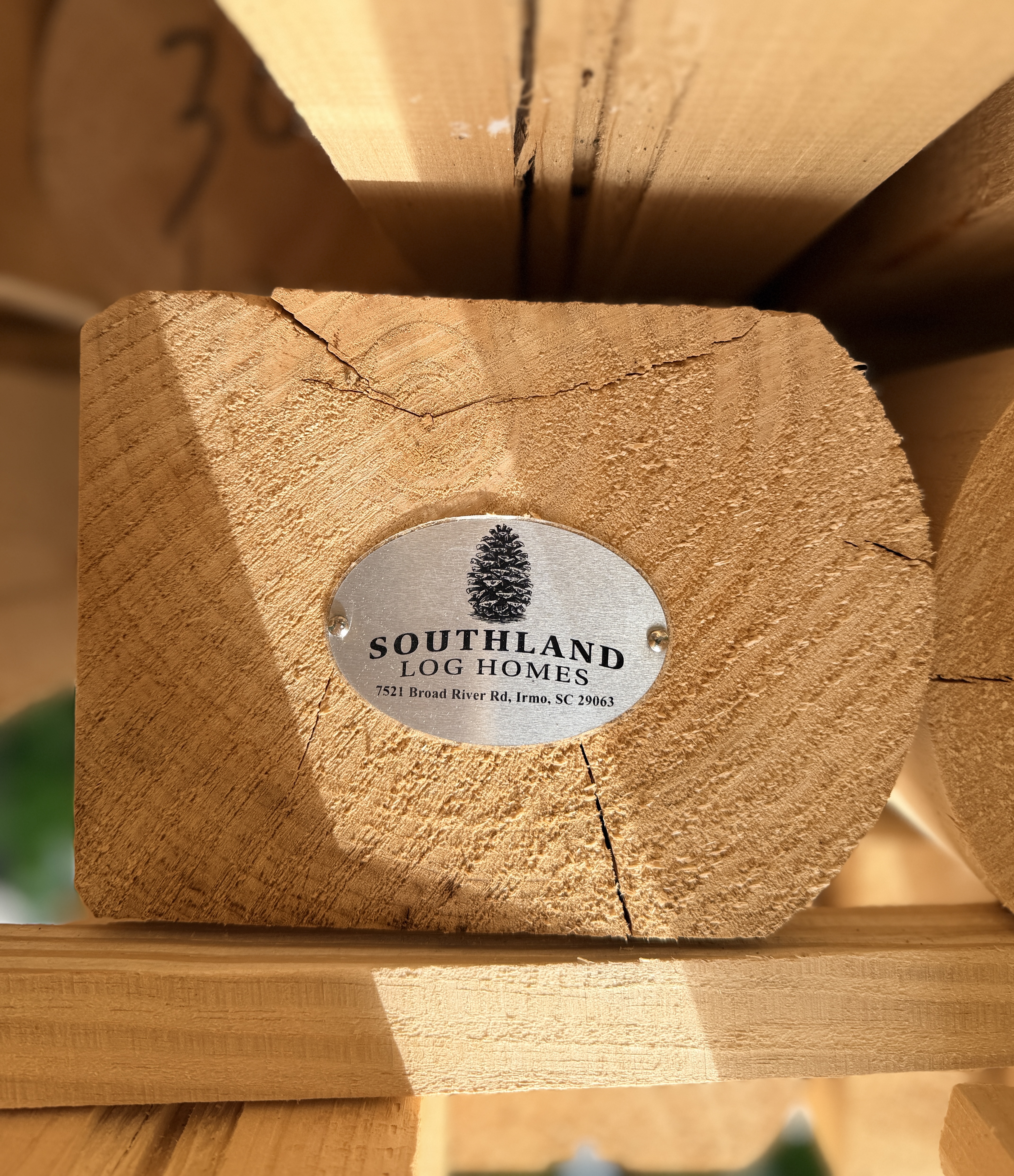 Where is this log going to go? southland plaque on logs